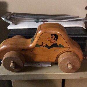 Classic Wooden Toy Car with Driver Illustration